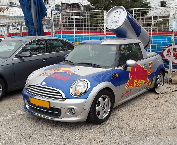 A car with a can on the roof